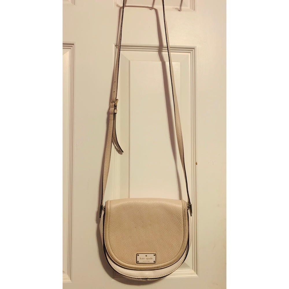 Kate Spade cream colored cross body purse